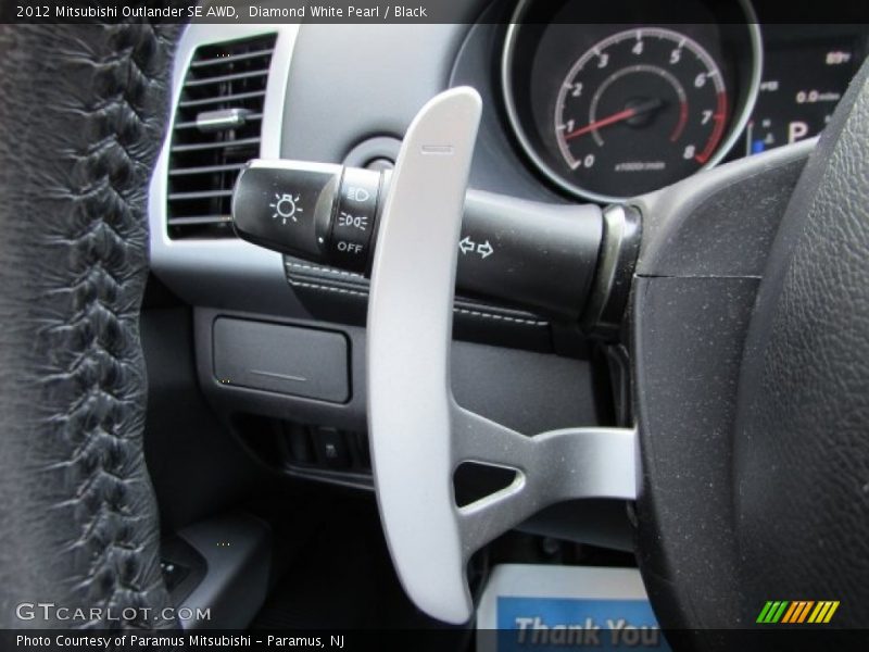 Diamond White Pearl / Black 2012 Mitsubishi Outlander SE AWD
