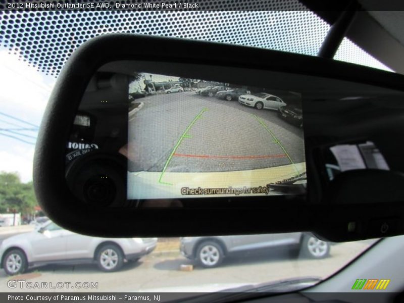 Diamond White Pearl / Black 2012 Mitsubishi Outlander SE AWD