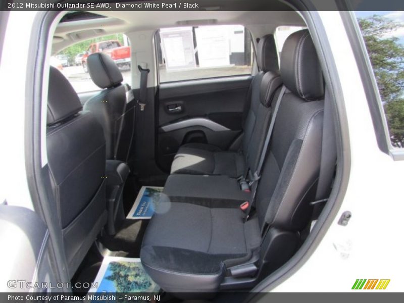Diamond White Pearl / Black 2012 Mitsubishi Outlander SE AWD