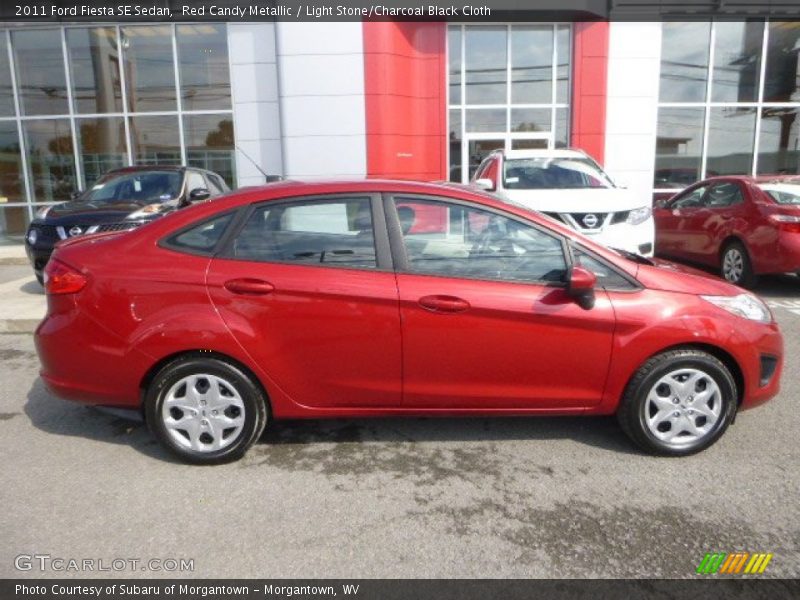 Red Candy Metallic / Light Stone/Charcoal Black Cloth 2011 Ford Fiesta SE Sedan