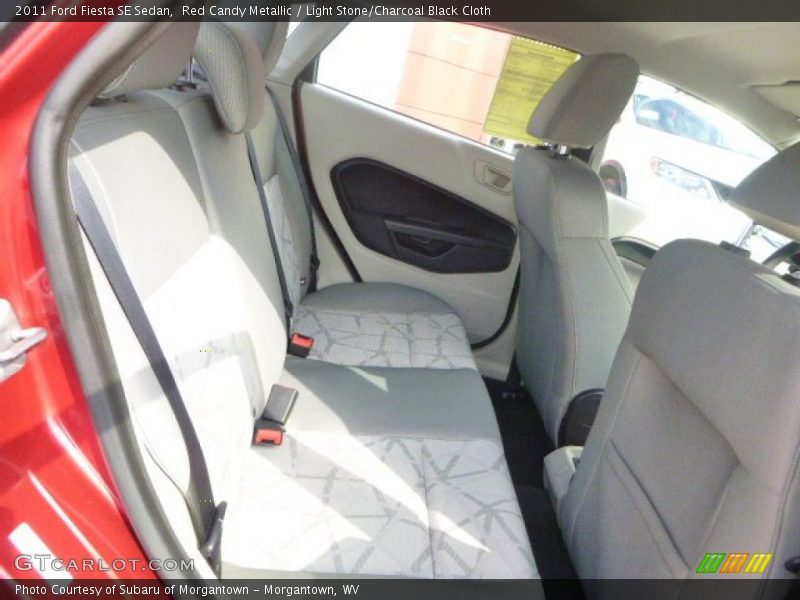 Red Candy Metallic / Light Stone/Charcoal Black Cloth 2011 Ford Fiesta SE Sedan