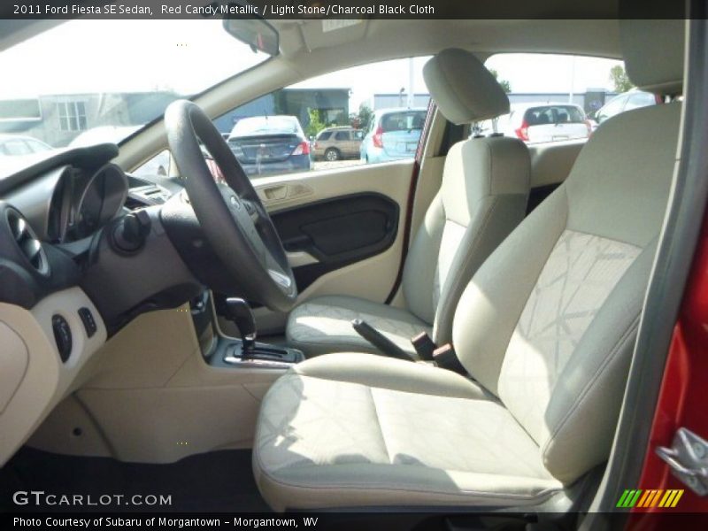 Red Candy Metallic / Light Stone/Charcoal Black Cloth 2011 Ford Fiesta SE Sedan