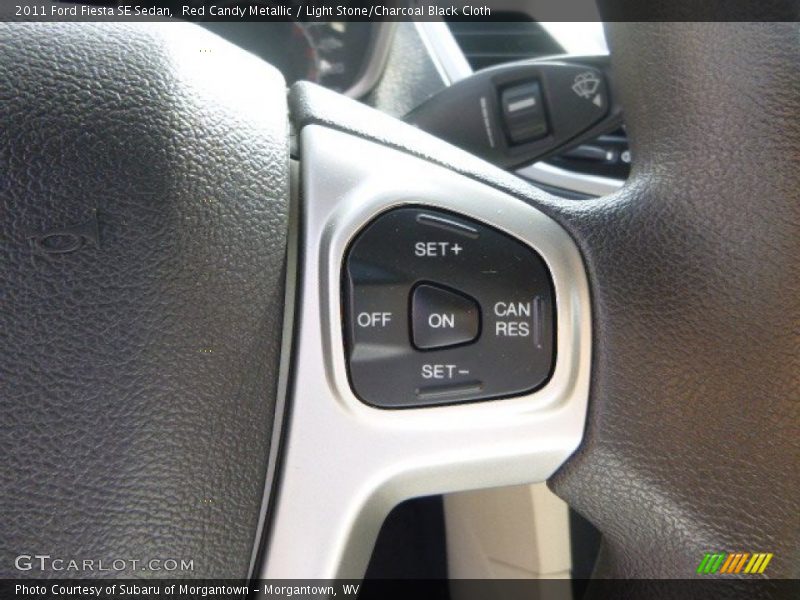Red Candy Metallic / Light Stone/Charcoal Black Cloth 2011 Ford Fiesta SE Sedan