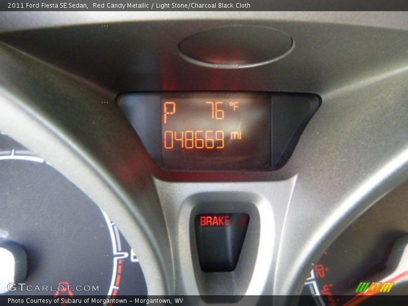 Red Candy Metallic / Light Stone/Charcoal Black Cloth 2011 Ford Fiesta SE Sedan
