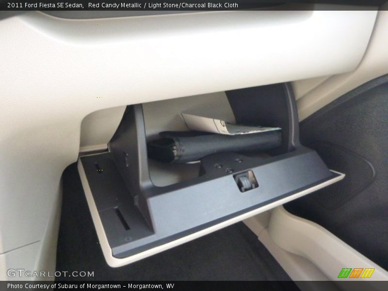 Red Candy Metallic / Light Stone/Charcoal Black Cloth 2011 Ford Fiesta SE Sedan