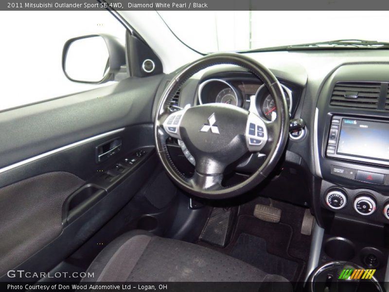 Diamond White Pearl / Black 2011 Mitsubishi Outlander Sport SE 4WD