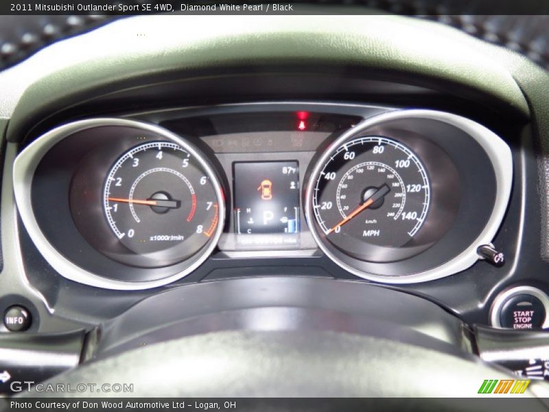 Diamond White Pearl / Black 2011 Mitsubishi Outlander Sport SE 4WD