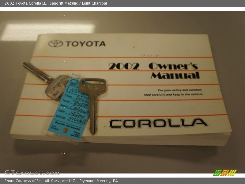 Sandrift Metallic / Light Charcoal 2002 Toyota Corolla LE