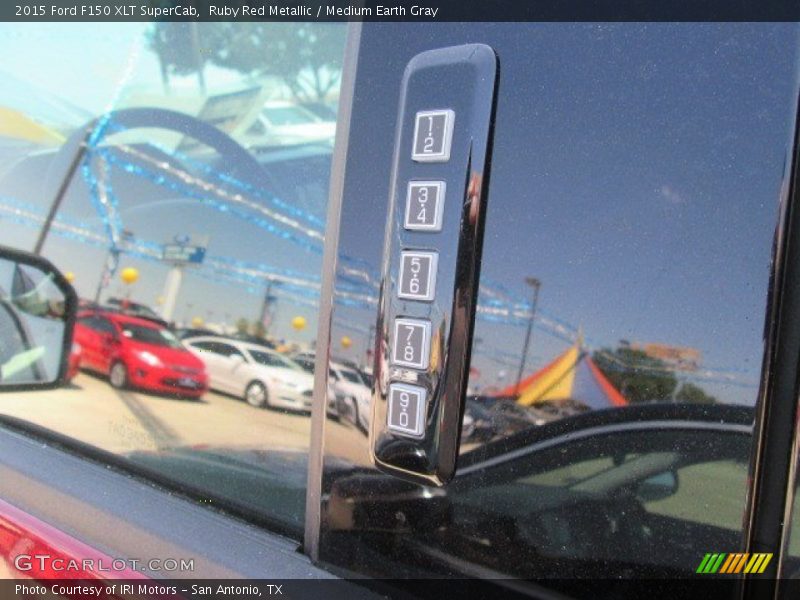 Ruby Red Metallic / Medium Earth Gray 2015 Ford F150 XLT SuperCab
