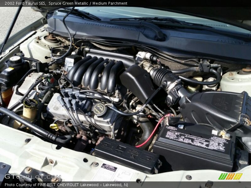 Spruce Green Metallic / Medium Parchment 2002 Ford Taurus SES