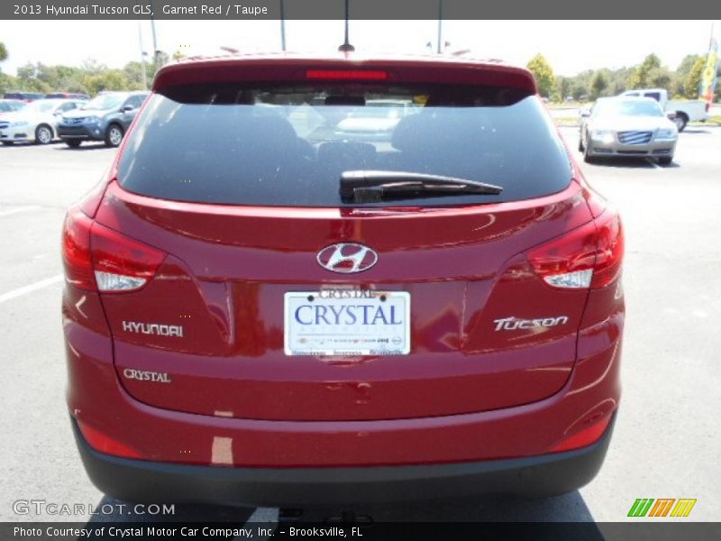 Garnet Red / Taupe 2013 Hyundai Tucson GLS