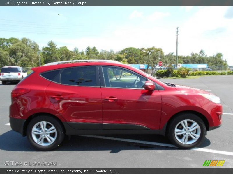 Garnet Red / Taupe 2013 Hyundai Tucson GLS