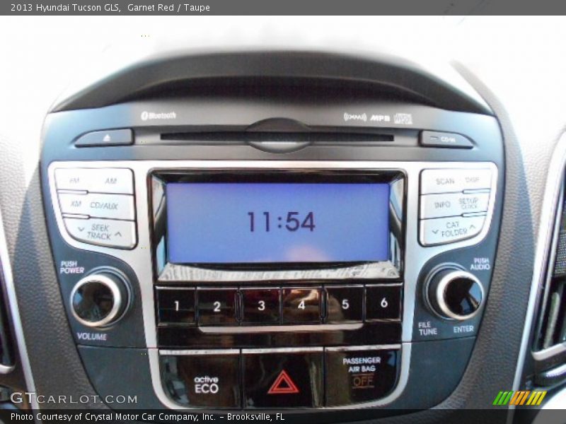 Garnet Red / Taupe 2013 Hyundai Tucson GLS