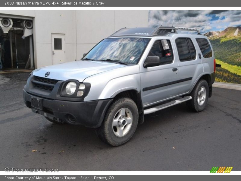 Front 3/4 View of 2003 Xterra XE V6 4x4