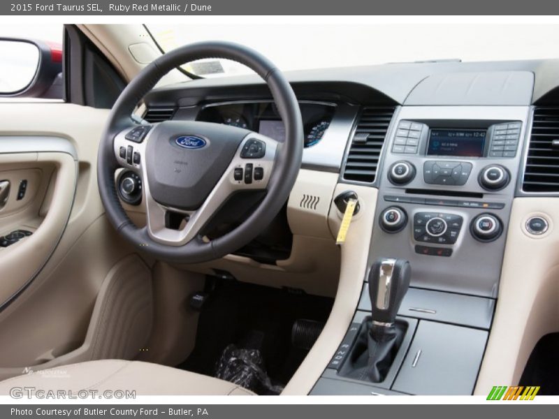 Ruby Red Metallic / Dune 2015 Ford Taurus SEL