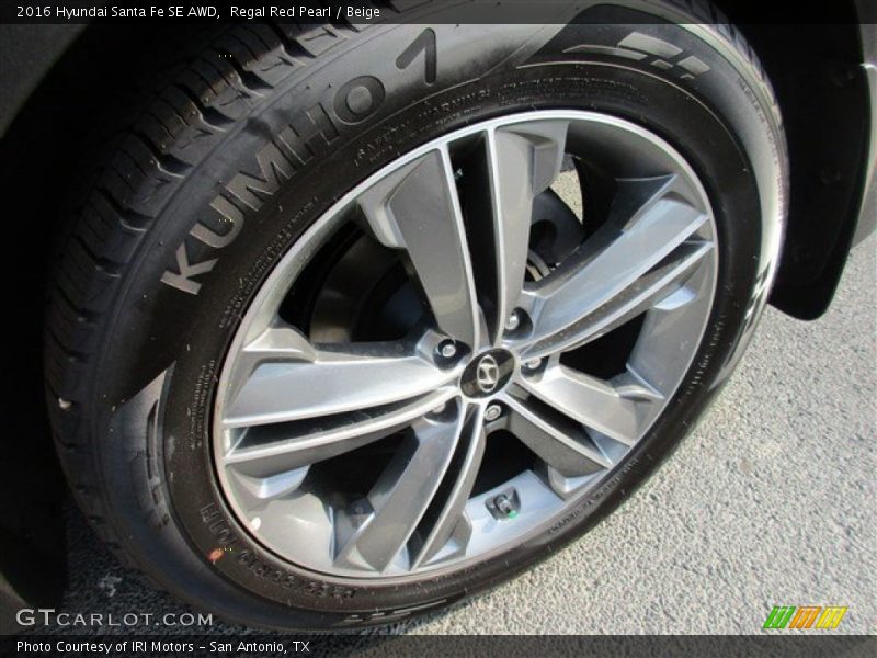 Regal Red Pearl / Beige 2016 Hyundai Santa Fe SE AWD