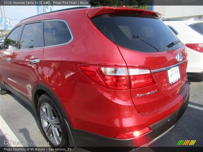 Regal Red Pearl / Beige 2016 Hyundai Santa Fe SE AWD