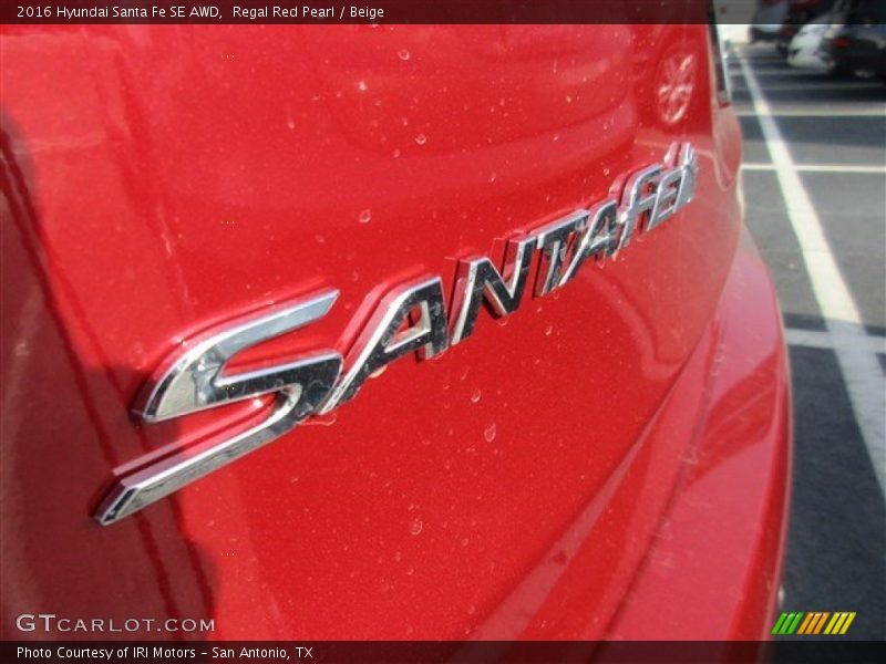Regal Red Pearl / Beige 2016 Hyundai Santa Fe SE AWD