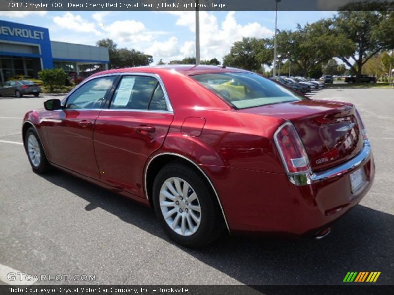 Deep Cherry Red Crystal Pearl / Black/Light Frost Beige 2012 Chrysler 300