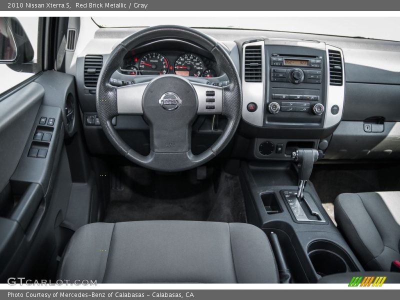 Red Brick Metallic / Gray 2010 Nissan Xterra S