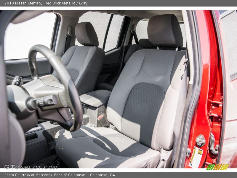 Red Brick Metallic / Gray 2010 Nissan Xterra S