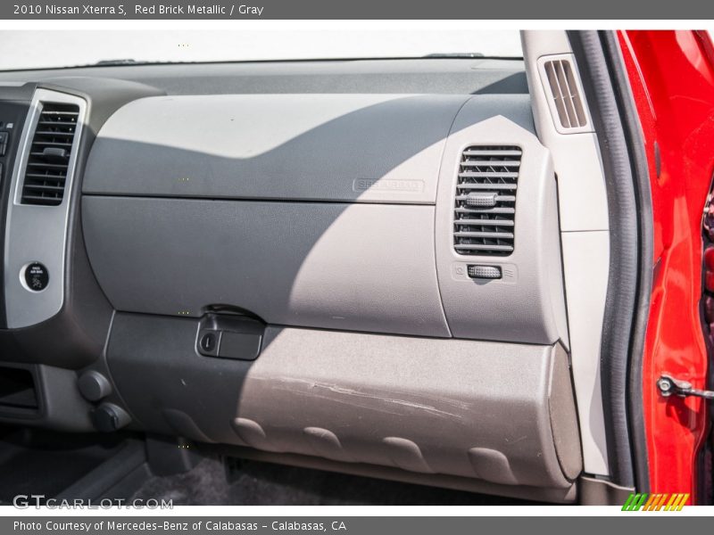 Red Brick Metallic / Gray 2010 Nissan Xterra S