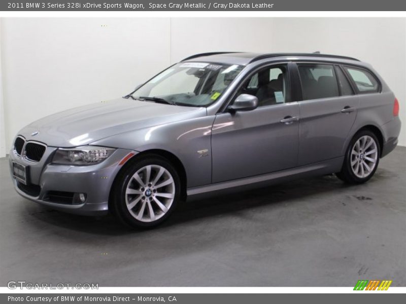 Front 3/4 View of 2011 3 Series 328i xDrive Sports Wagon