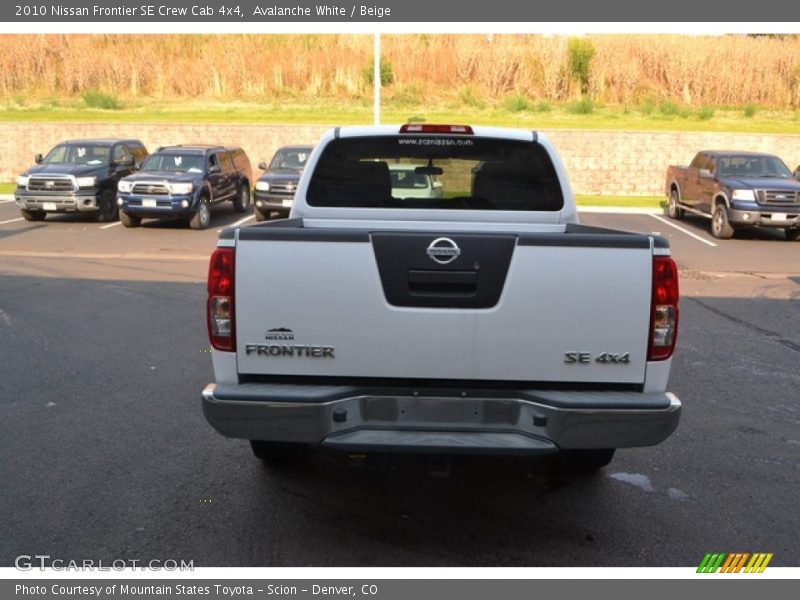 Avalanche White / Beige 2010 Nissan Frontier SE Crew Cab 4x4