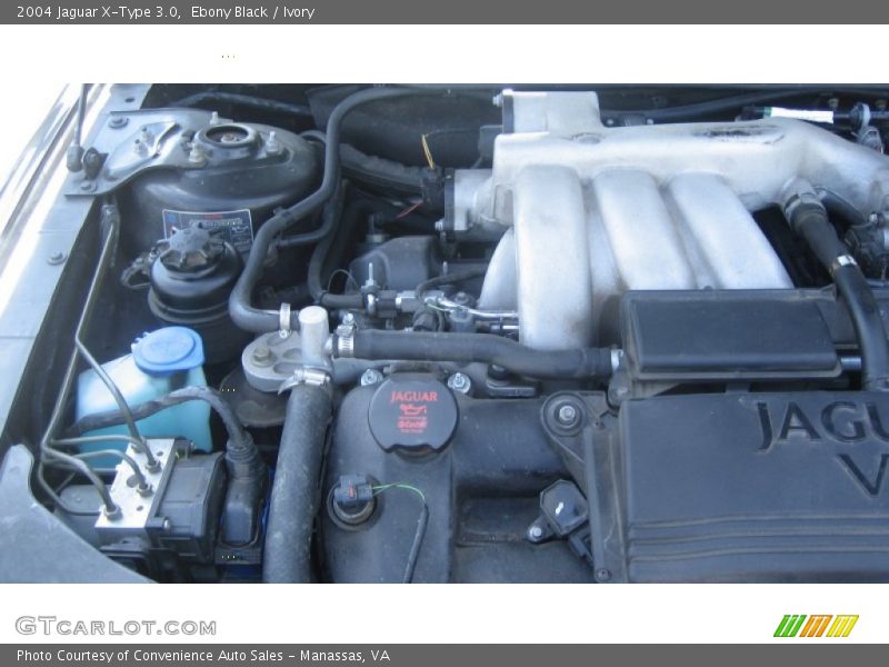 Ebony Black / Ivory 2004 Jaguar X-Type 3.0
