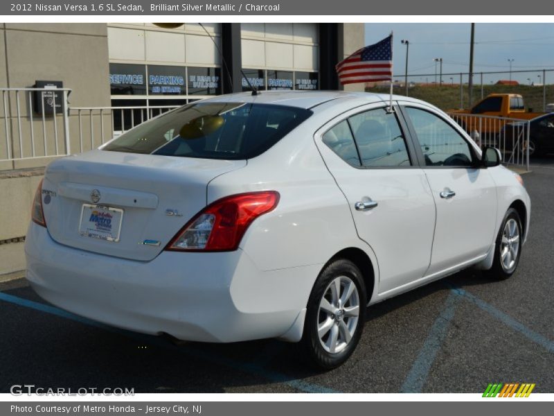 Brilliant Silver Metallic / Charcoal 2012 Nissan Versa 1.6 SL Sedan