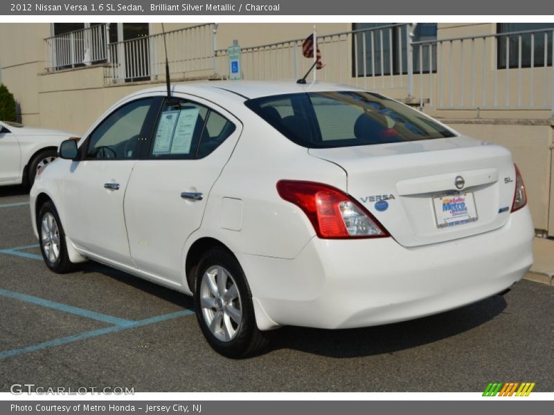 Brilliant Silver Metallic / Charcoal 2012 Nissan Versa 1.6 SL Sedan