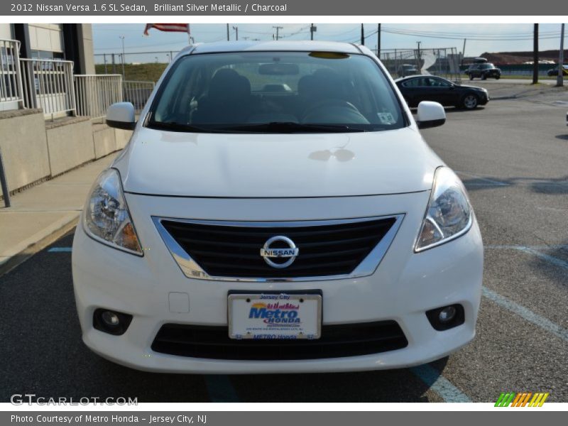 Brilliant Silver Metallic / Charcoal 2012 Nissan Versa 1.6 SL Sedan