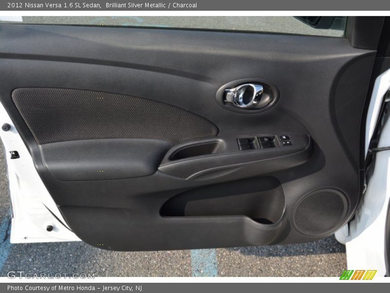 Brilliant Silver Metallic / Charcoal 2012 Nissan Versa 1.6 SL Sedan