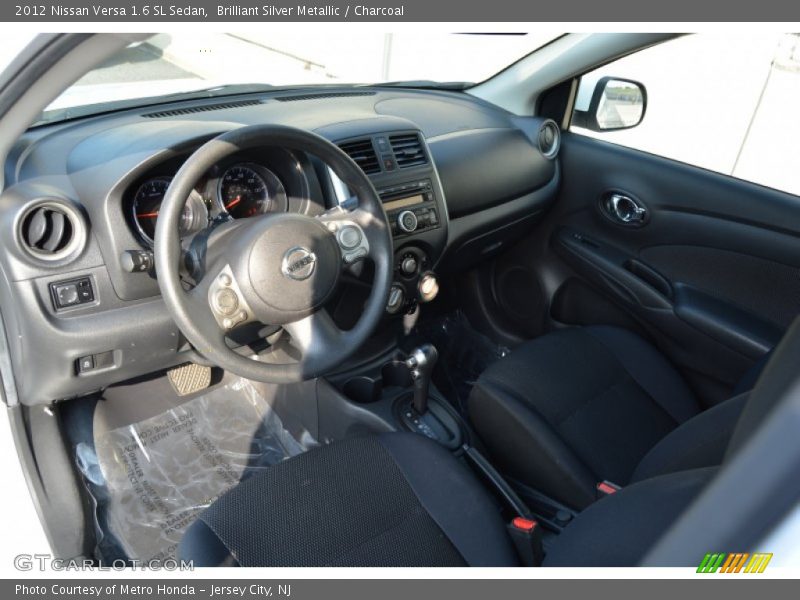 Brilliant Silver Metallic / Charcoal 2012 Nissan Versa 1.6 SL Sedan