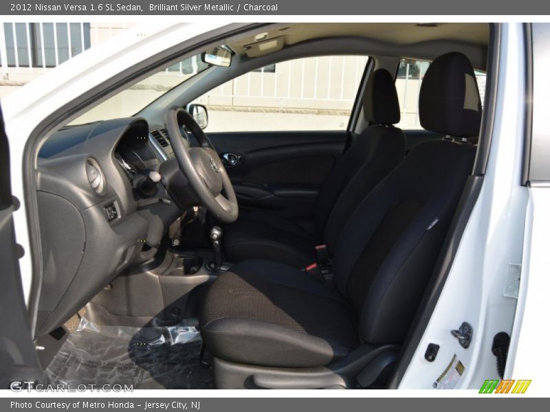 Brilliant Silver Metallic / Charcoal 2012 Nissan Versa 1.6 SL Sedan