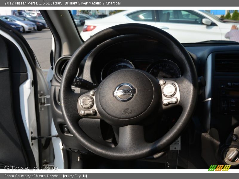 Brilliant Silver Metallic / Charcoal 2012 Nissan Versa 1.6 SL Sedan