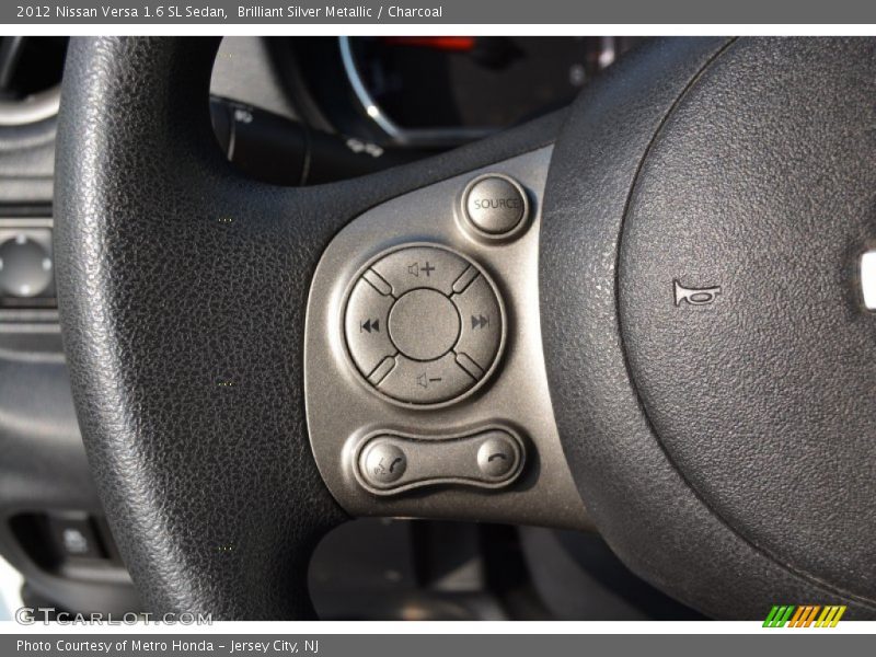 Brilliant Silver Metallic / Charcoal 2012 Nissan Versa 1.6 SL Sedan