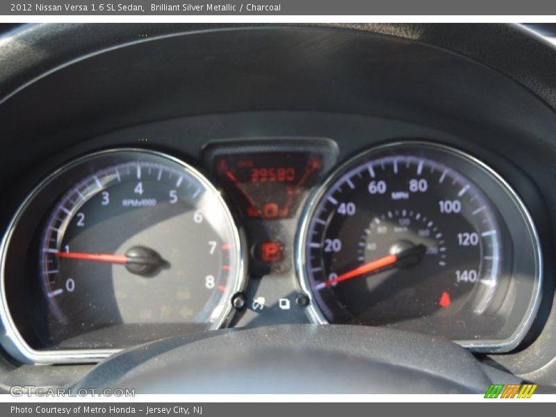Brilliant Silver Metallic / Charcoal 2012 Nissan Versa 1.6 SL Sedan