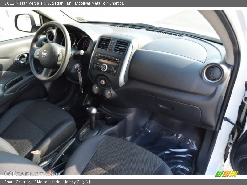Brilliant Silver Metallic / Charcoal 2012 Nissan Versa 1.6 SL Sedan