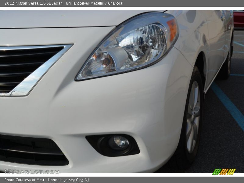 Brilliant Silver Metallic / Charcoal 2012 Nissan Versa 1.6 SL Sedan