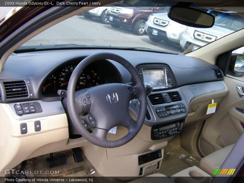 Dark Cherry Pearl / Ivory 2009 Honda Odyssey EX-L
