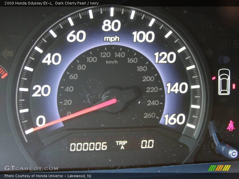 Dark Cherry Pearl / Ivory 2009 Honda Odyssey EX-L