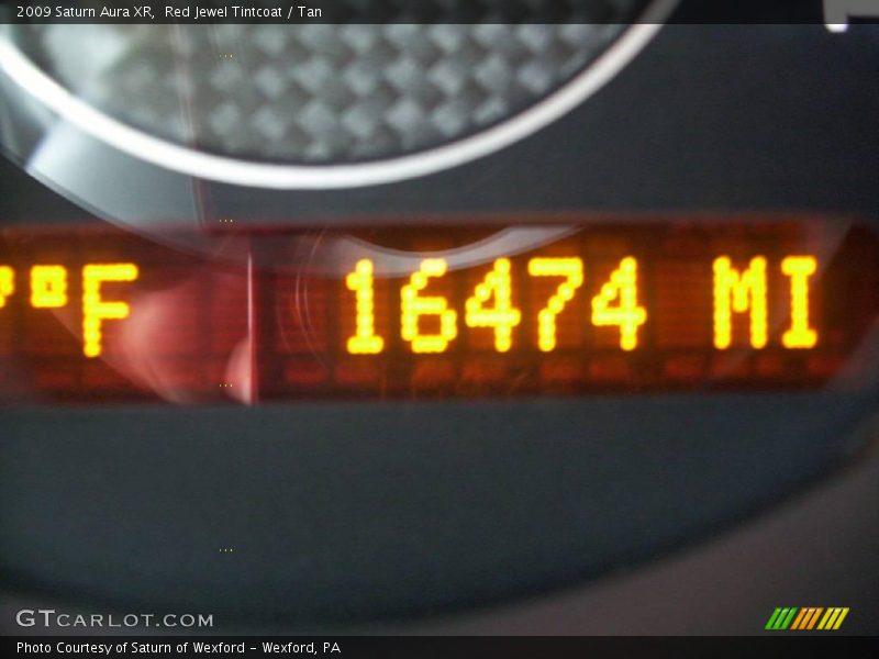 Red Jewel Tintcoat / Tan 2009 Saturn Aura XR