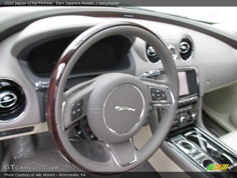 Dark Sapphire Metallic / Ivory/Oyster 2015 Jaguar XJ XJL Portfolio