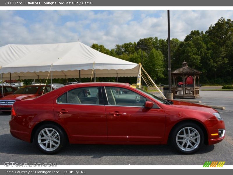 Sangria Red Metallic / Camel 2010 Ford Fusion SEL