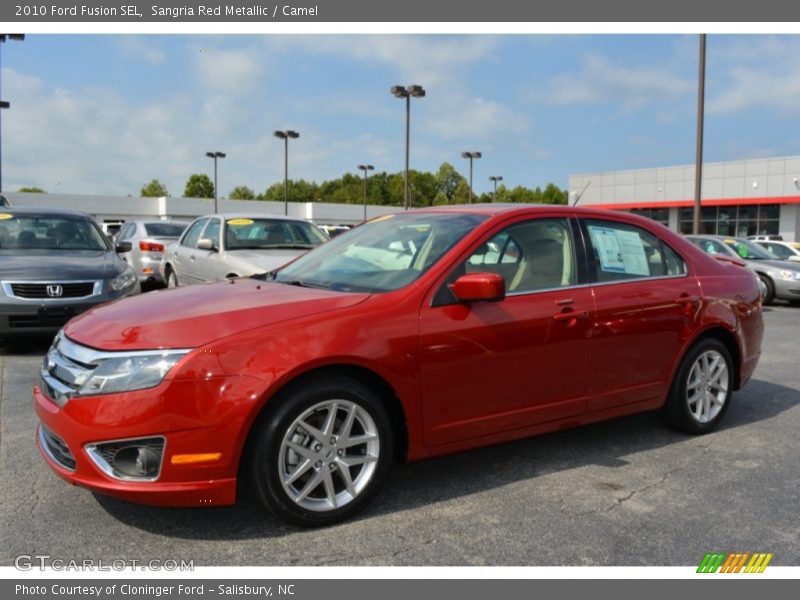 Sangria Red Metallic / Camel 2010 Ford Fusion SEL