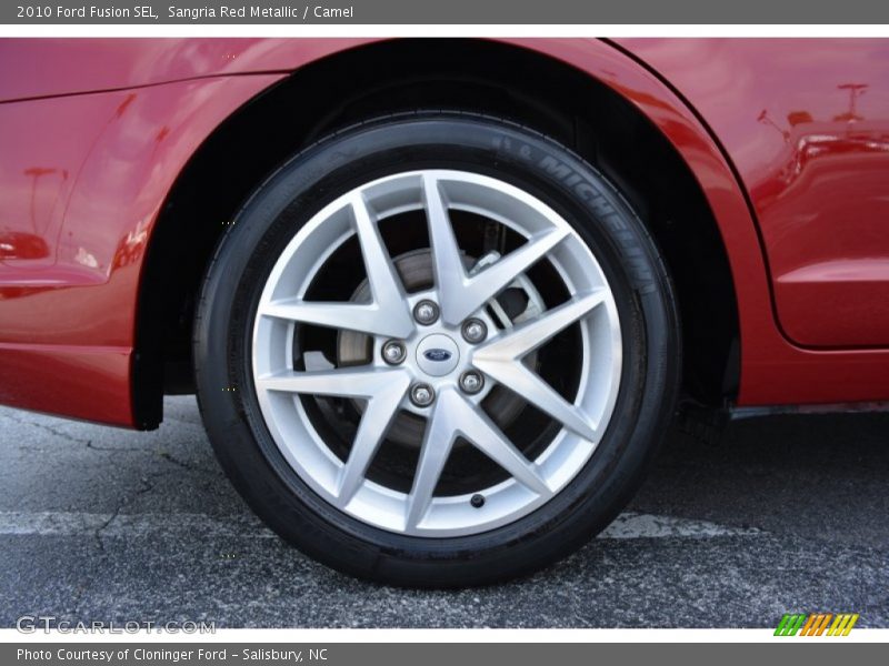 Sangria Red Metallic / Camel 2010 Ford Fusion SEL