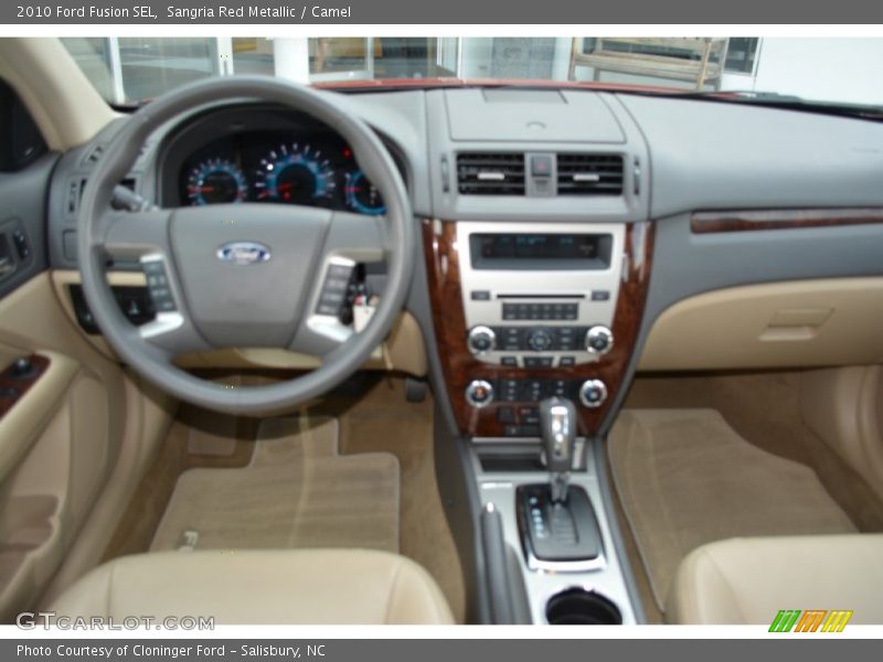 Sangria Red Metallic / Camel 2010 Ford Fusion SEL