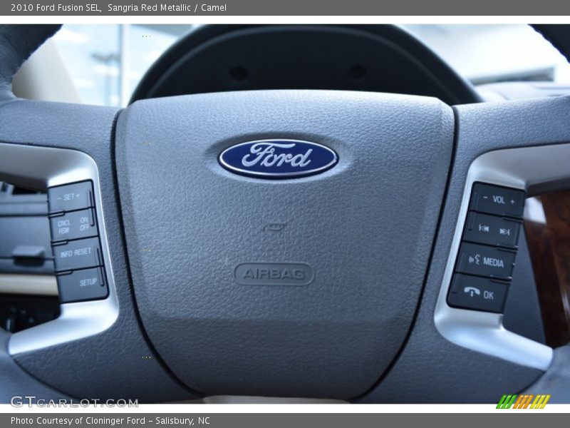 Sangria Red Metallic / Camel 2010 Ford Fusion SEL