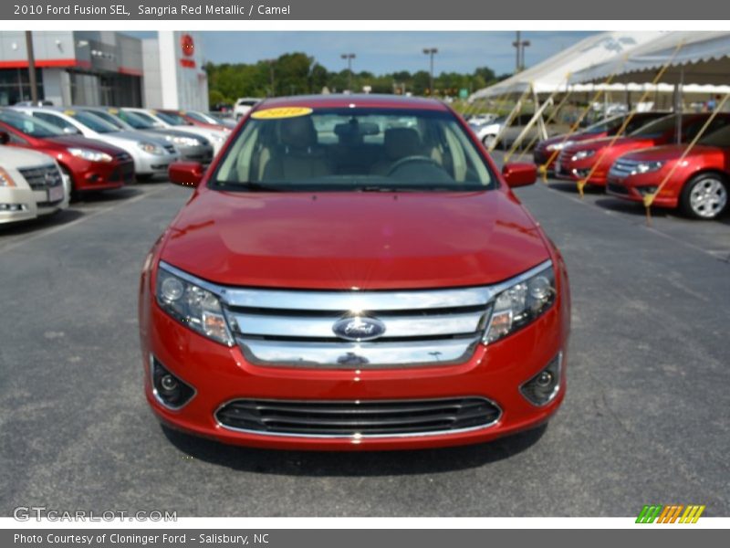 Sangria Red Metallic / Camel 2010 Ford Fusion SEL